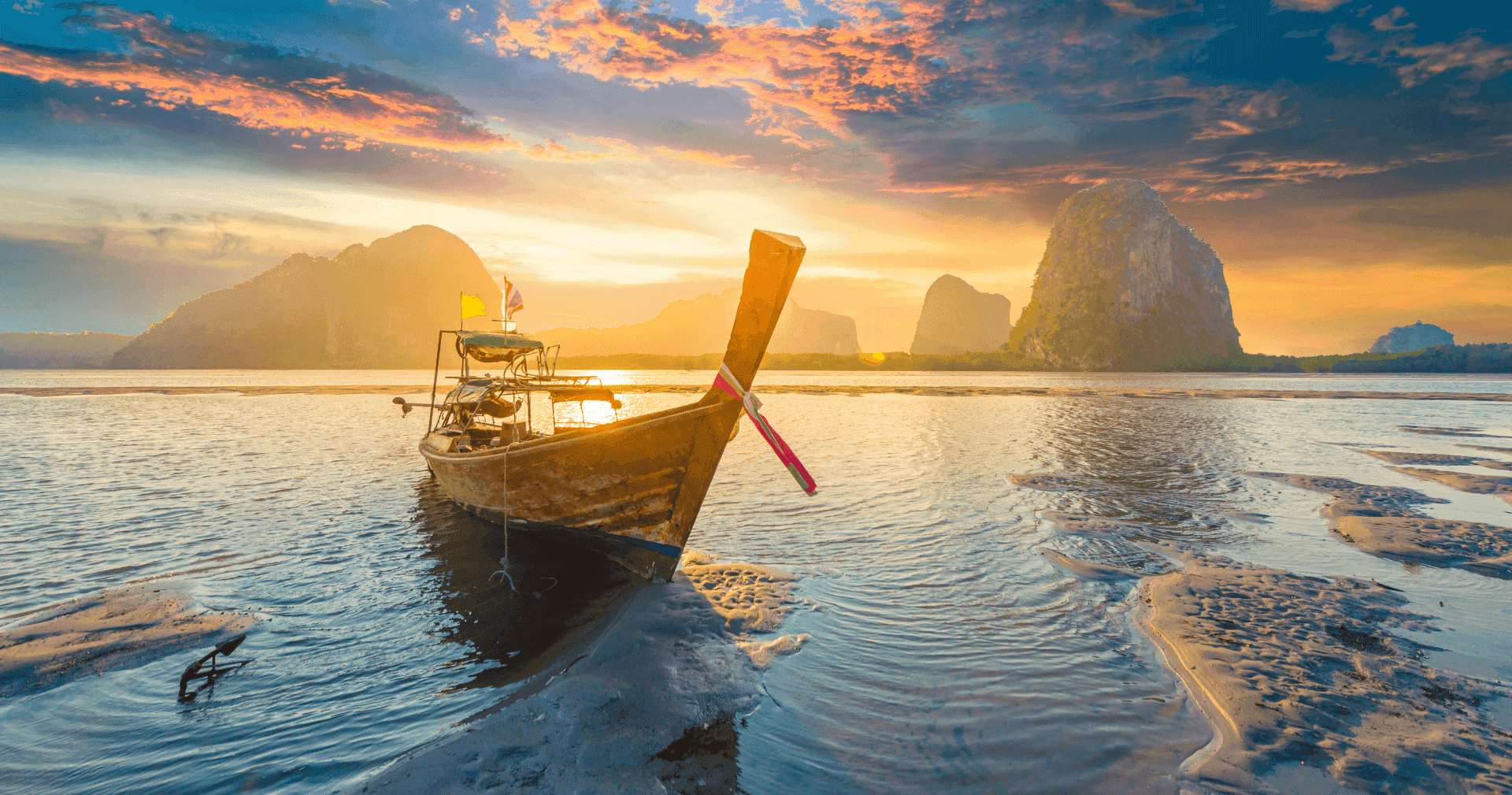 Long tail boat in Thailand during sunset